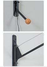 Modern Swing Arm Wall Sconce with Extended Reach in Matte Black