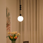 Bola Modern Pendant Light with Opal Glass Globe and Black Spheres