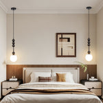 Bola Modern Pendant Light with Opal Glass Globe and Black Spheres