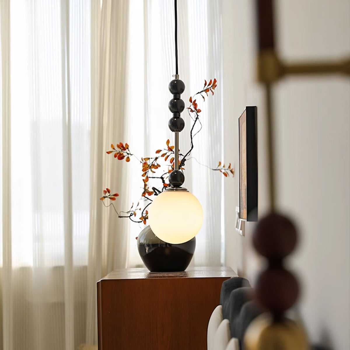 Bola Modern Pendant Light with Opal Glass Globe and Black Spheres