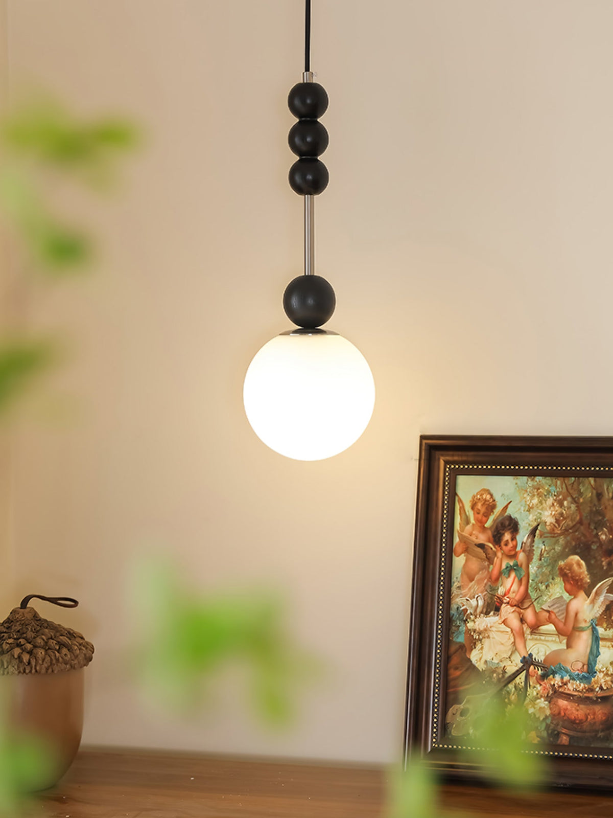 Bola Modern Pendant Light with Opal Glass Globe and Black Spheres