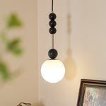 Bola Modern Pendant Light with Opal Glass Globe and Black Spheres