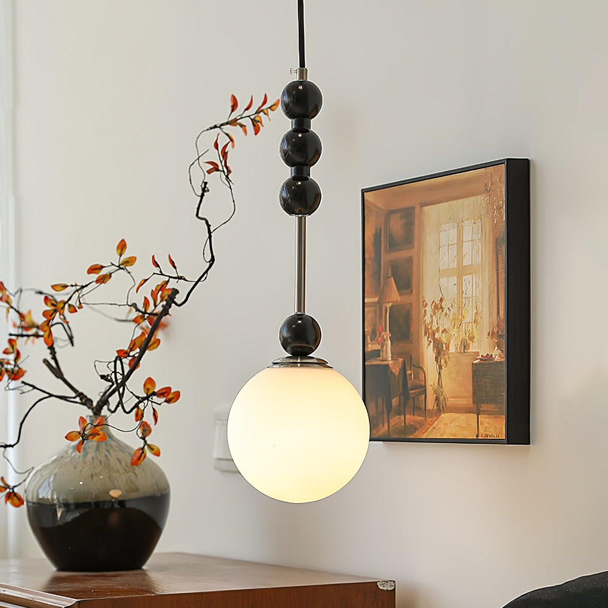 Bola Modern Pendant Light with Opal Glass Globe and Black Spheres