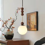 Bola Modern Pendant Light with Opal Glass Globe and Black Spheres