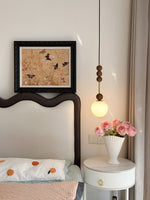 Bola Modern Pendant Light with Opal Glass Globe and Black Spheres