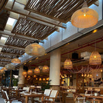 Artisan Braided Rattan Swag Pendant Light with Natural Wood Accents