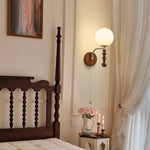 Bramwell Wall Sconce with Wood Accents and Frosted Glass Globe