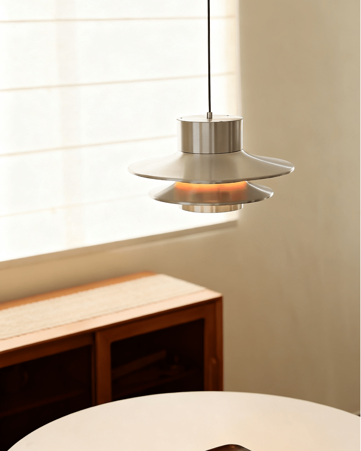Caelith Chrome Sculptural Tiered Pendant Light for Modern Interiors