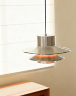 Caelith Chrome Sculptural Tiered Pendant Light for Modern Interiors