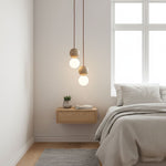 Camille Travertine Pendant Light – Natural Stone Sphere with Opal Glass Globe