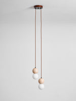Camille Travertine Pendant Light – Natural Stone Sphere with Opal Glass Globe