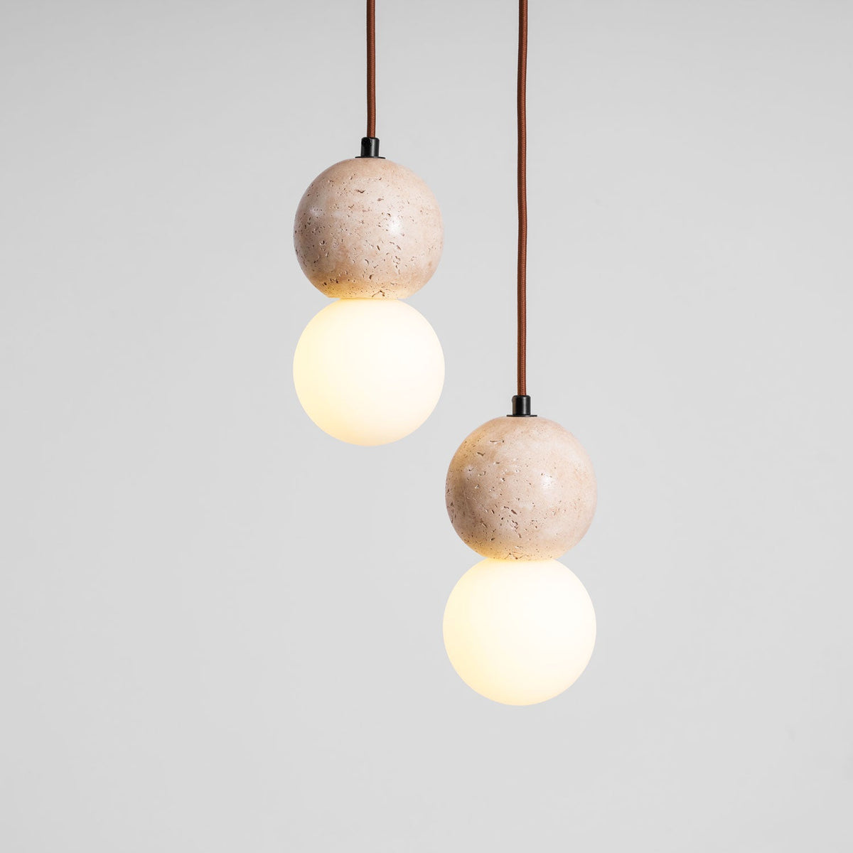 Camille Travertine Pendant Light – Natural Stone Sphere with Opal Glass Globe