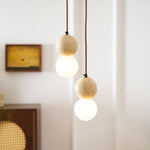 Camille Travertine Pendant Light – Natural Stone Sphere with Opal Glass Globe