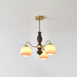 Caramel Glass Orb Chandelier with Gold and Walnut Finishes