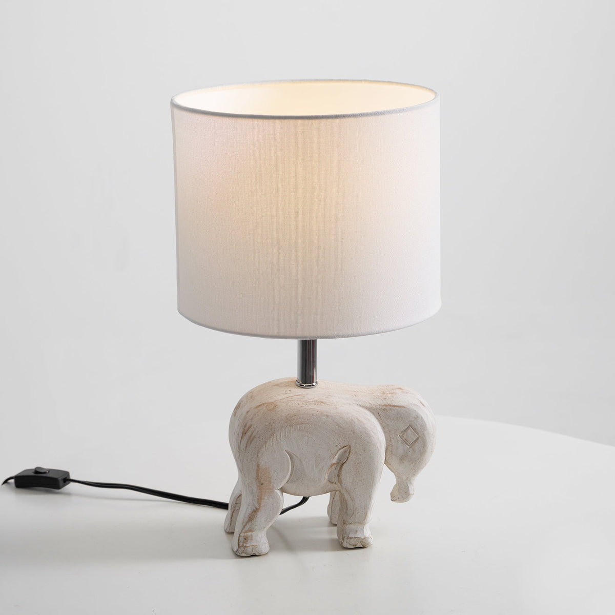 carved-wood-animal-table-lamp