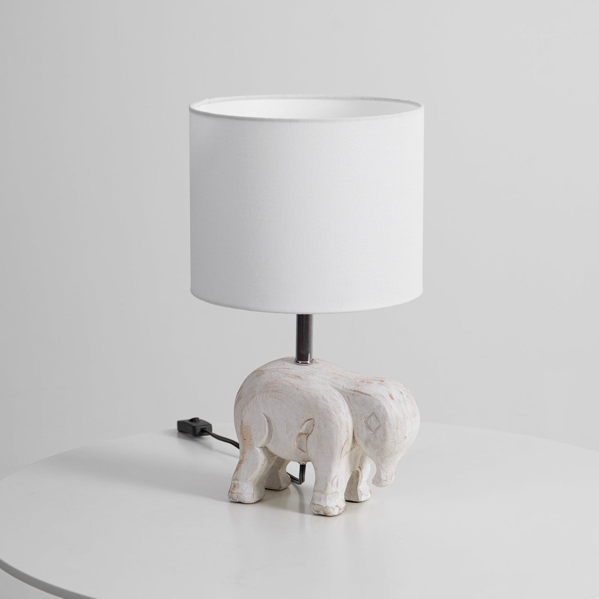 carved-wood-animal-table-lamp