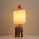 carved-wood-animal-table-lamp