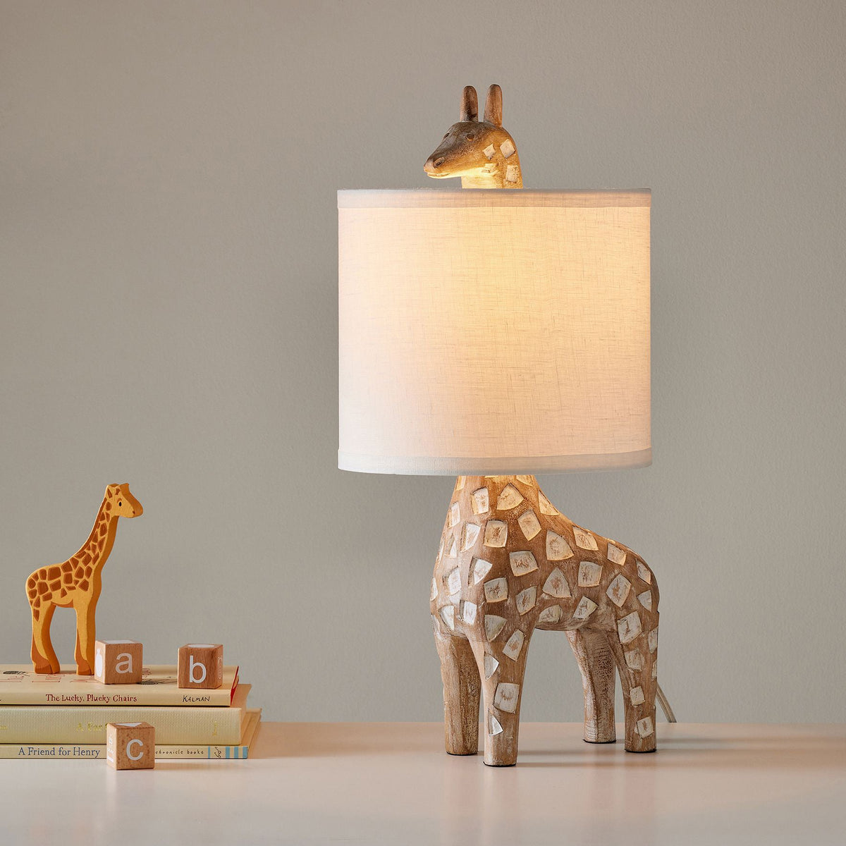 carved-wood-animal-table-lamp
