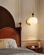 Celeste Curved Wall Sconce in Gold or Black with Pleated Glass Shade