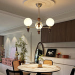 Celestial Sphere Walnut Chandelier – Modern Wood & Glass Pendant Light