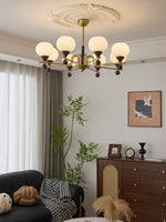 Ceylian Modern Wood and Glass Chandelier with Brass Accents for Dining Room and Foyer