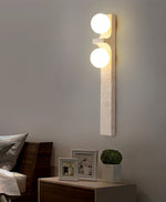 Cirra Travertine Wall Sconce — Sculptural Stone Ambient Lighting