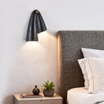 Creska Sculptural Wall Sconce in Black Travertine and Walnut