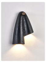 Creska Sculptural Wall Sconce in Black Travertine and Walnut