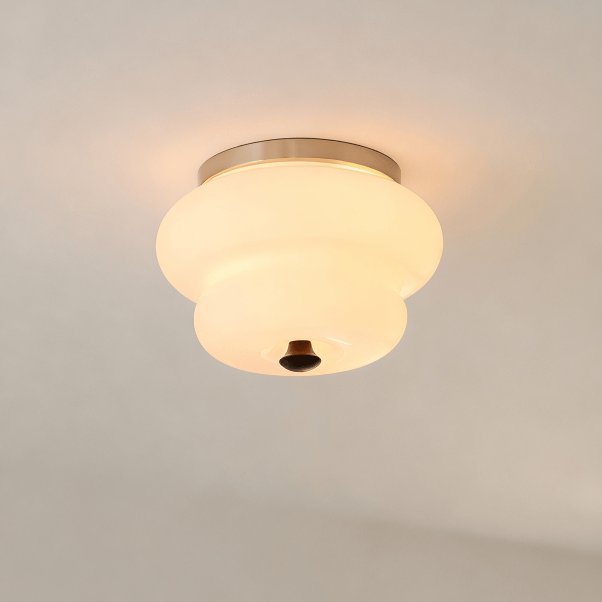 Curvaceous Flush Mount Ceiling Light with Gold Accents and Glass Shade