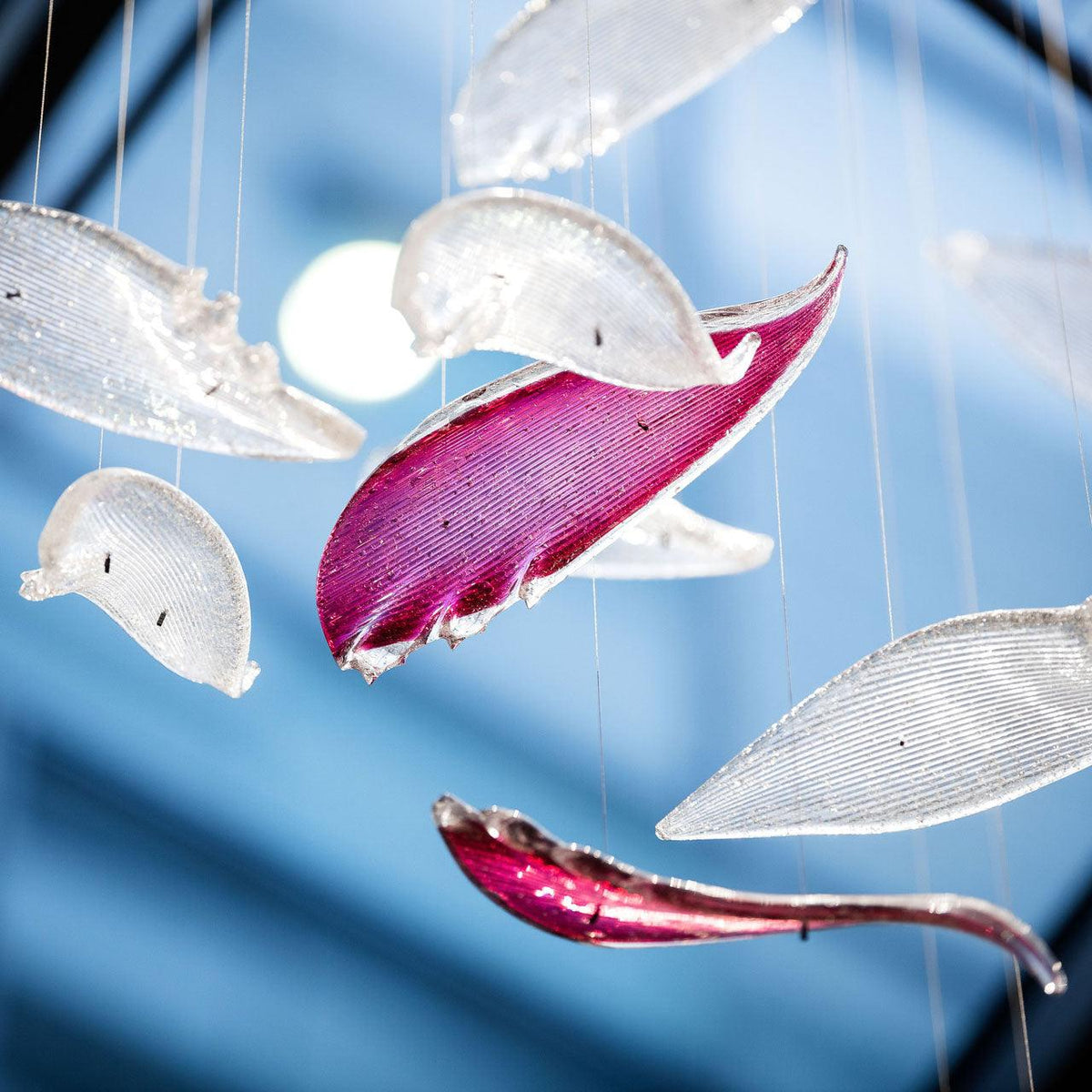 diy-flying-glass-feather-chandelier