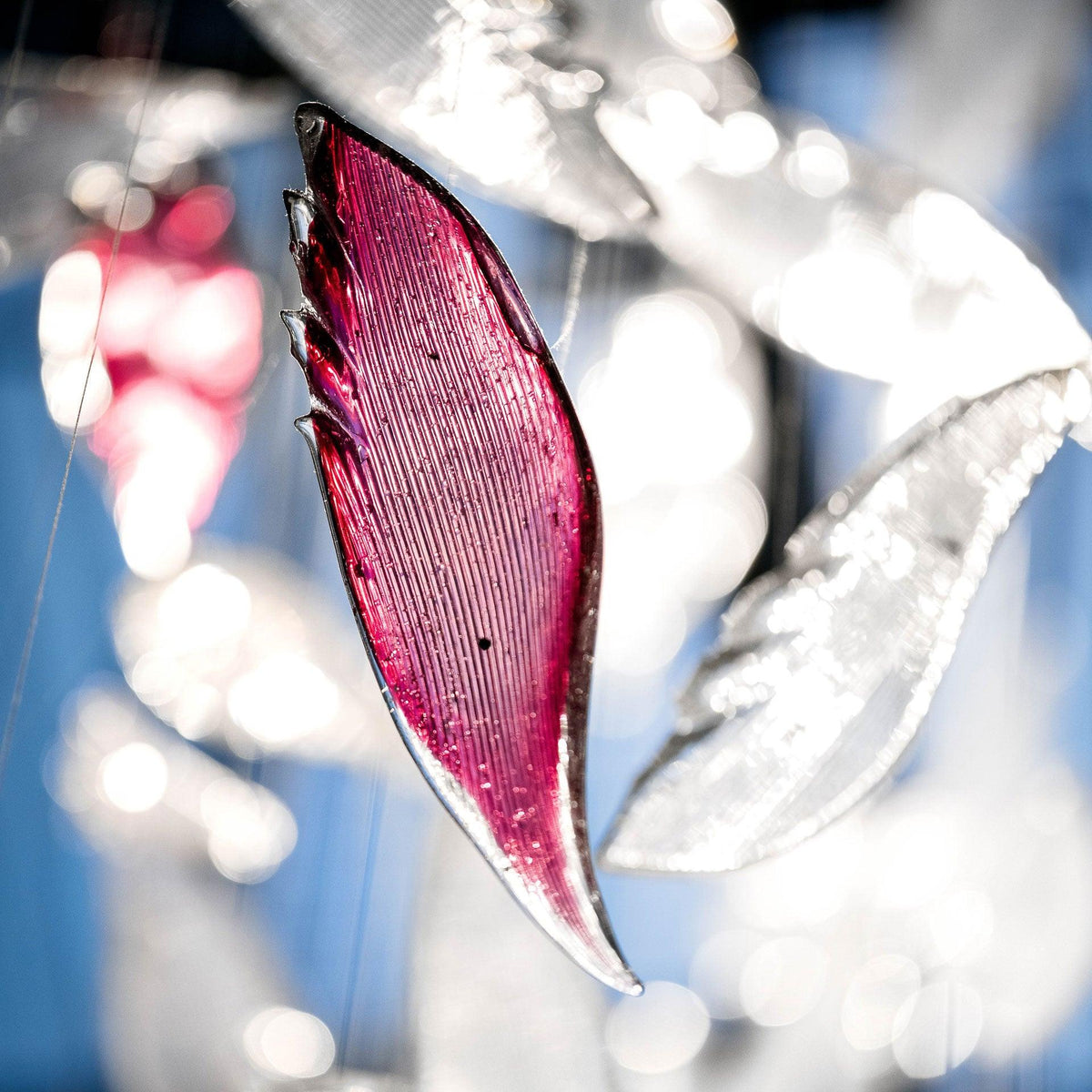 diy-flying-glass-feather-chandelier