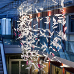 diy-flying-glass-feather-chandelier