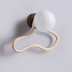 Driftform Travertine Wall Sconce with Opal Glass Globe