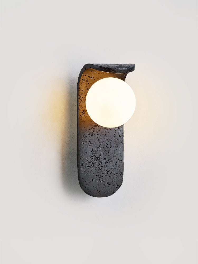 Eclipse Orb Wall Sconce in Black Travertine with Opal Glass Shade