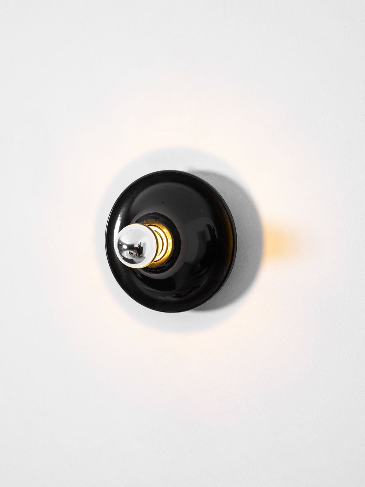 Eclipta Wall Sconce – Sculptural Metal & Glass Halo Light for Modern Interiors
