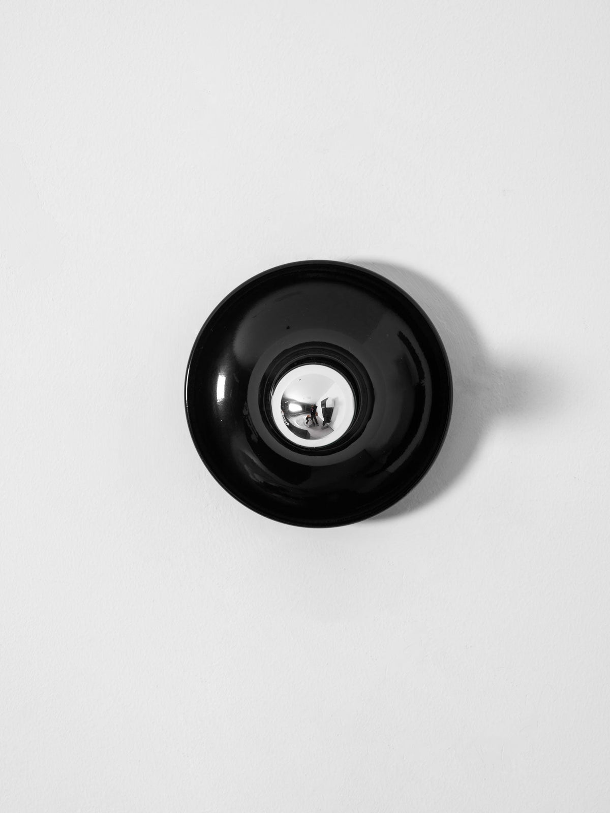 Eclipta Wall Sconce – Sculptural Metal & Glass Halo Light for Modern Interiors