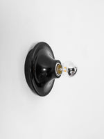 Eclipta Wall Sconce – Sculptural Metal & Glass Halo Light for Modern Interiors