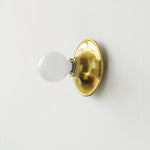 Eclipta Wall Sconce – Sculptural Metal & Glass Halo Light for Modern Interiors