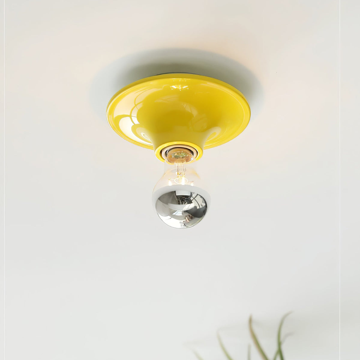 Eclipta Wall Sconce – Sculptural Metal & Glass Halo Light for Modern Interiors