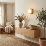 Elira Wall Sconce in Yellow Travertine with Opal Glass Shade