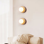 Elira Wall Sconce in Yellow Travertine with Opal Glass Shade