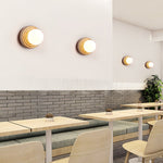 Elira Wall Sconce in Yellow Travertine with Opal Glass Shade