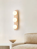 Elysian Travertine Wall Sconce with Glass Globes – Modern Natural Stone Lighting