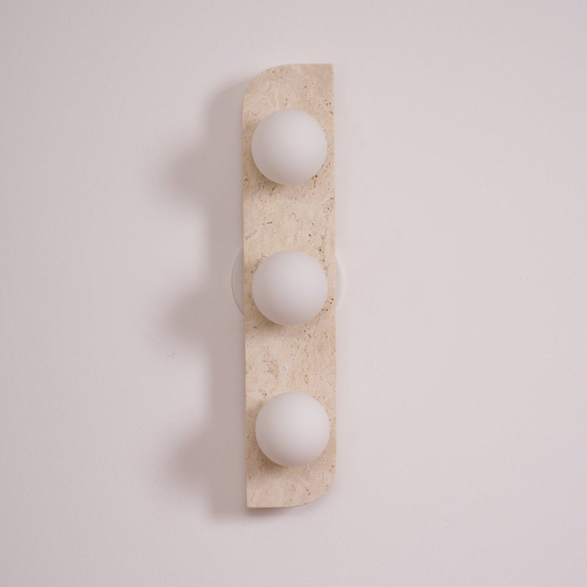 Elysian Travertine Wall Sconce with Glass Globes – Modern Natural Stone Lighting