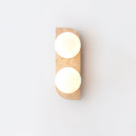 Elysian Travertine Plug-in Wall Sconce with Glass Globes