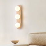 Elysian Travertine Wall Sconce with Glass Globes – Modern Natural Stone Lighting
