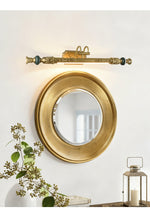 Emory Brass Wall Sconce with Green Accents for Classic Interiors