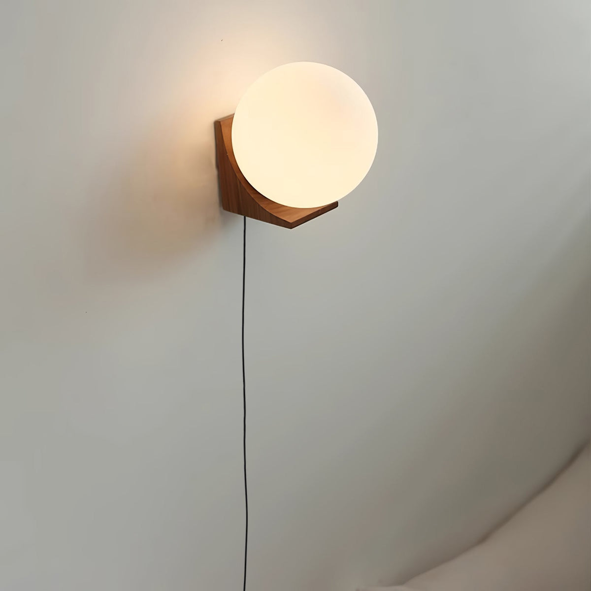 Evelyn Orb Plug-in Wall Sconce in Natural Oak and Dark Walnut