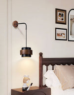 Event Horizon Wall Sconce in Black Travertine and Walnut