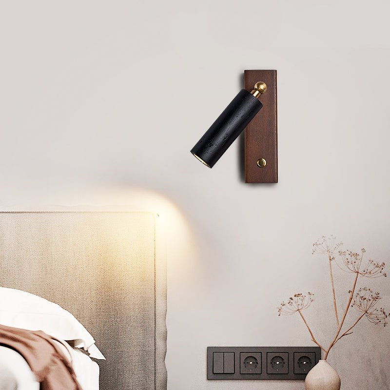 Event Horizon Adjustable Wall Sconce in Black Travertine and Brass